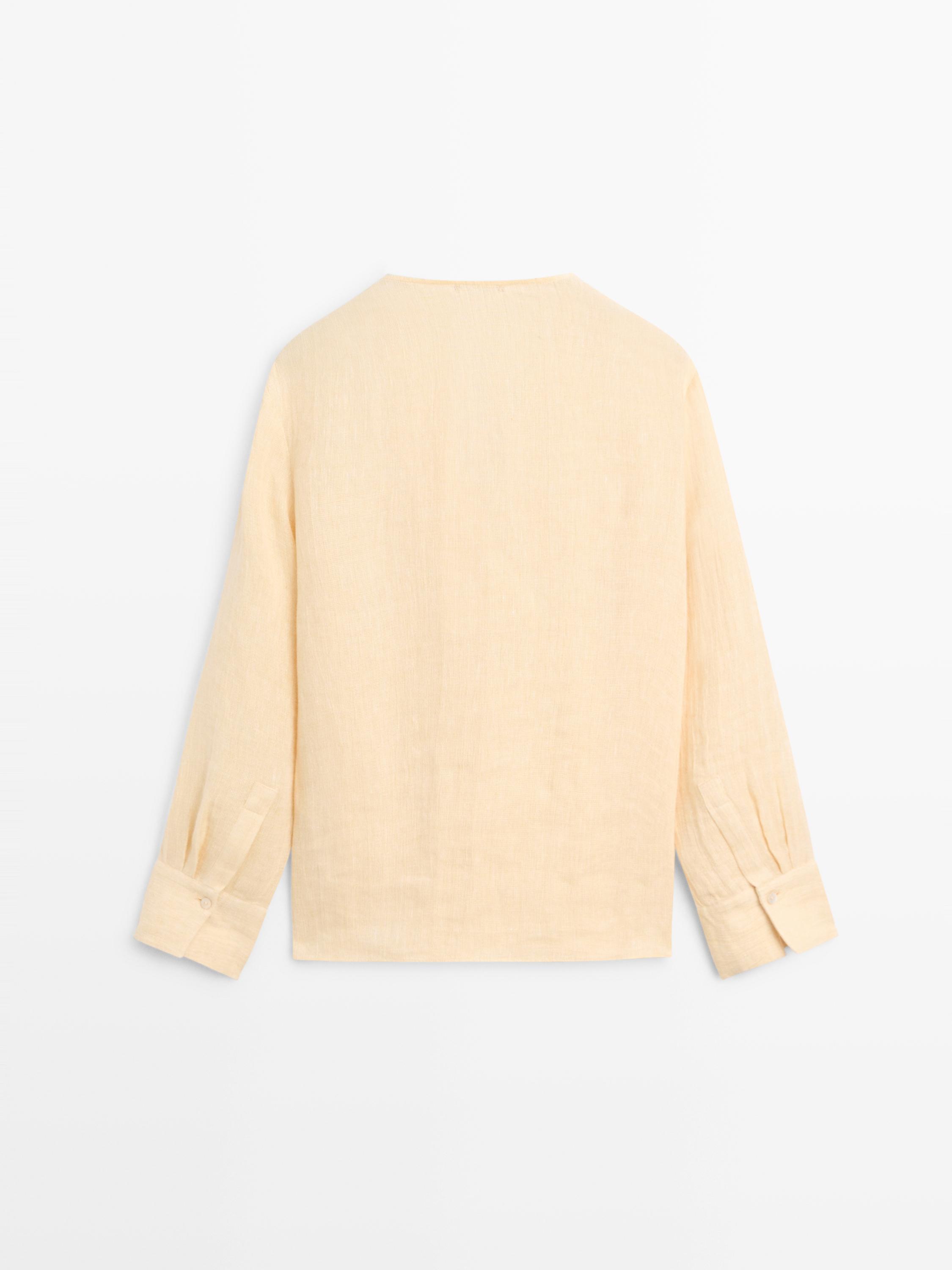 Flowing linen blouse with chest detail